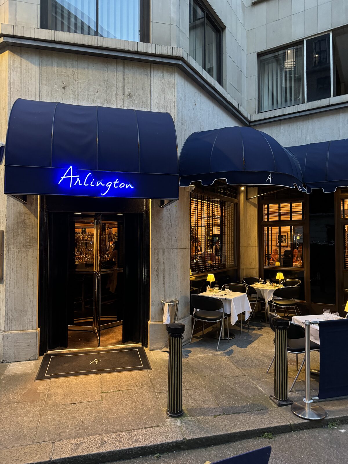 The blue awnings on Arlington Street at dusk
