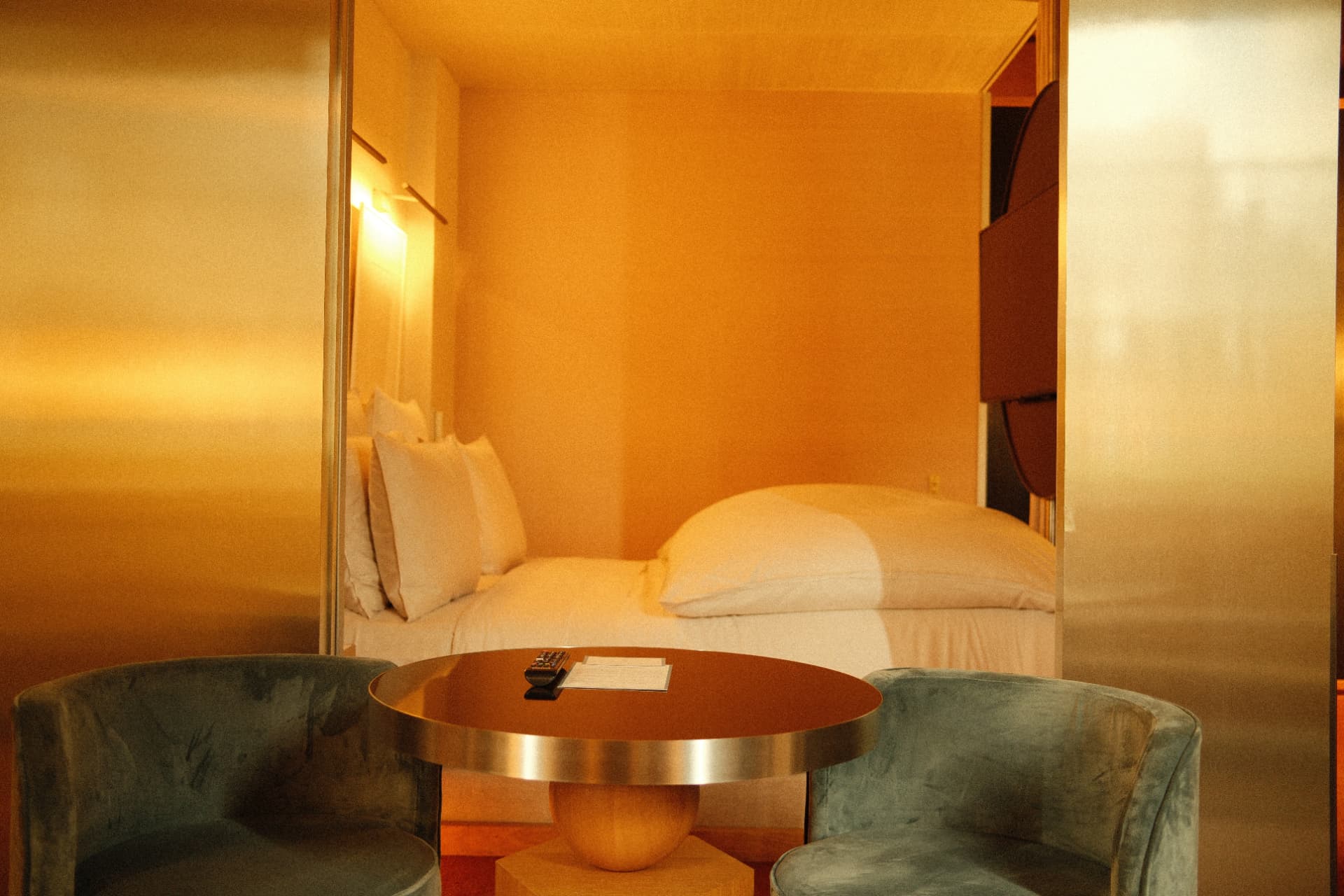 The bed through the brass partition