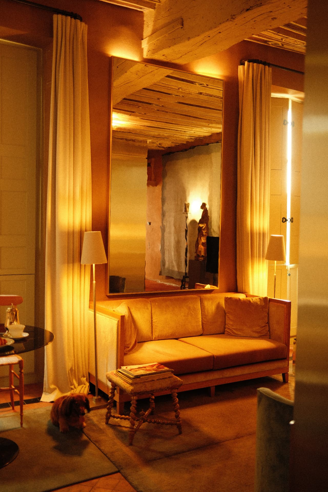 Mirror, sofa, and Pookie