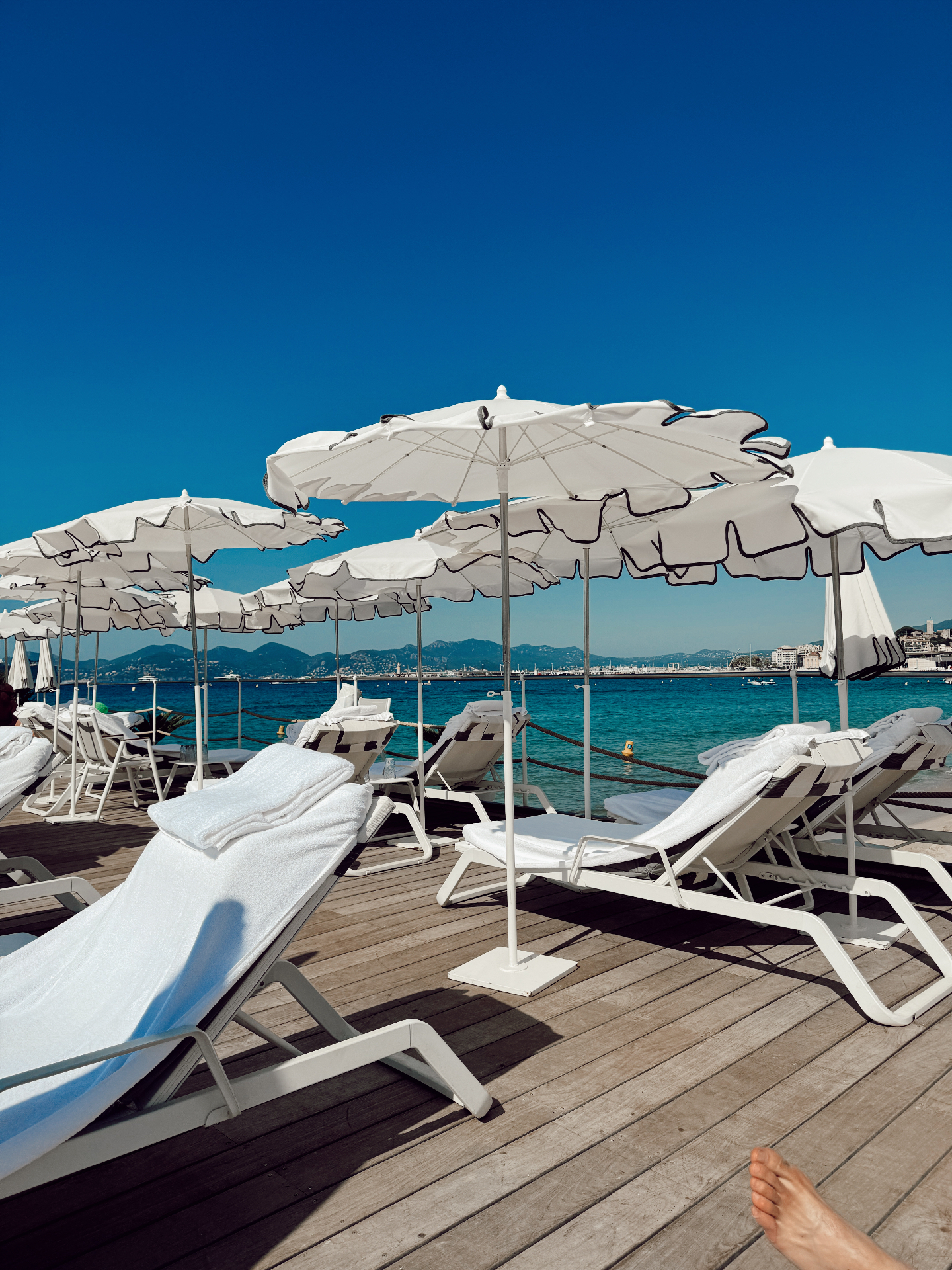 Pier lounges with the bay beyond